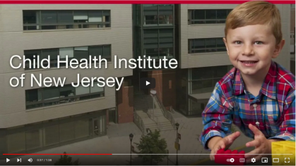 Screenshot of a video still showing a young child playing with the words Child Health Institute of New Jersey to their left.
